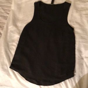 Black silky label, no size S/M possibly, woman’s dress tank top.